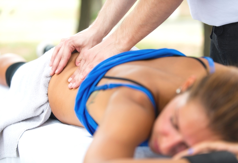 Young-handsome-man-enjoying-a-back-massage Massage
